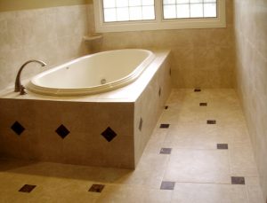 Custom Tiled Bathroom Floor and tub surround